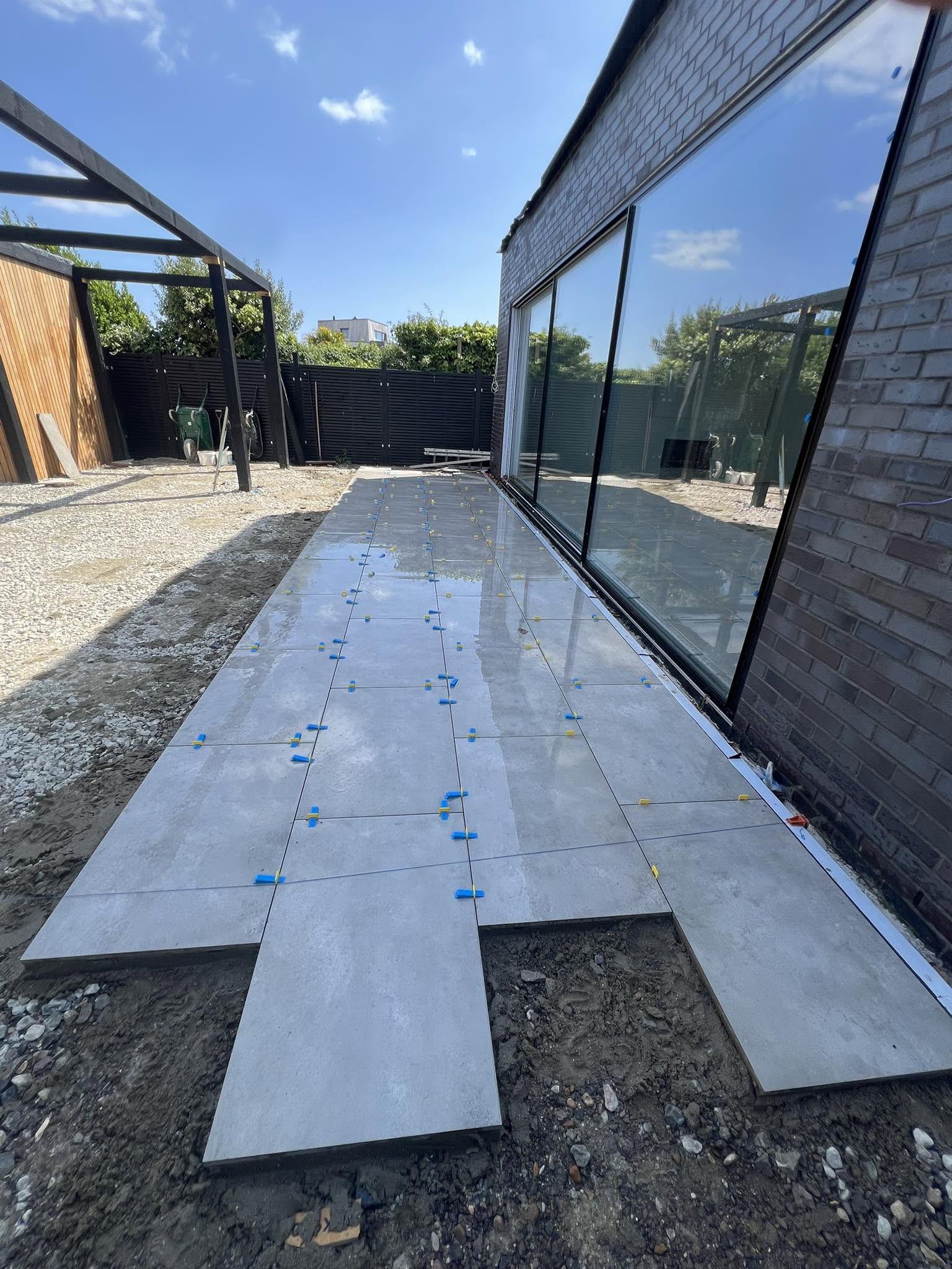 The Vitrified Porcelain Paving and Landscape Engineering Manual: Sub-Grade Mechanics, SBR Slurry Bonding, and Sustainable Drainage Architecture