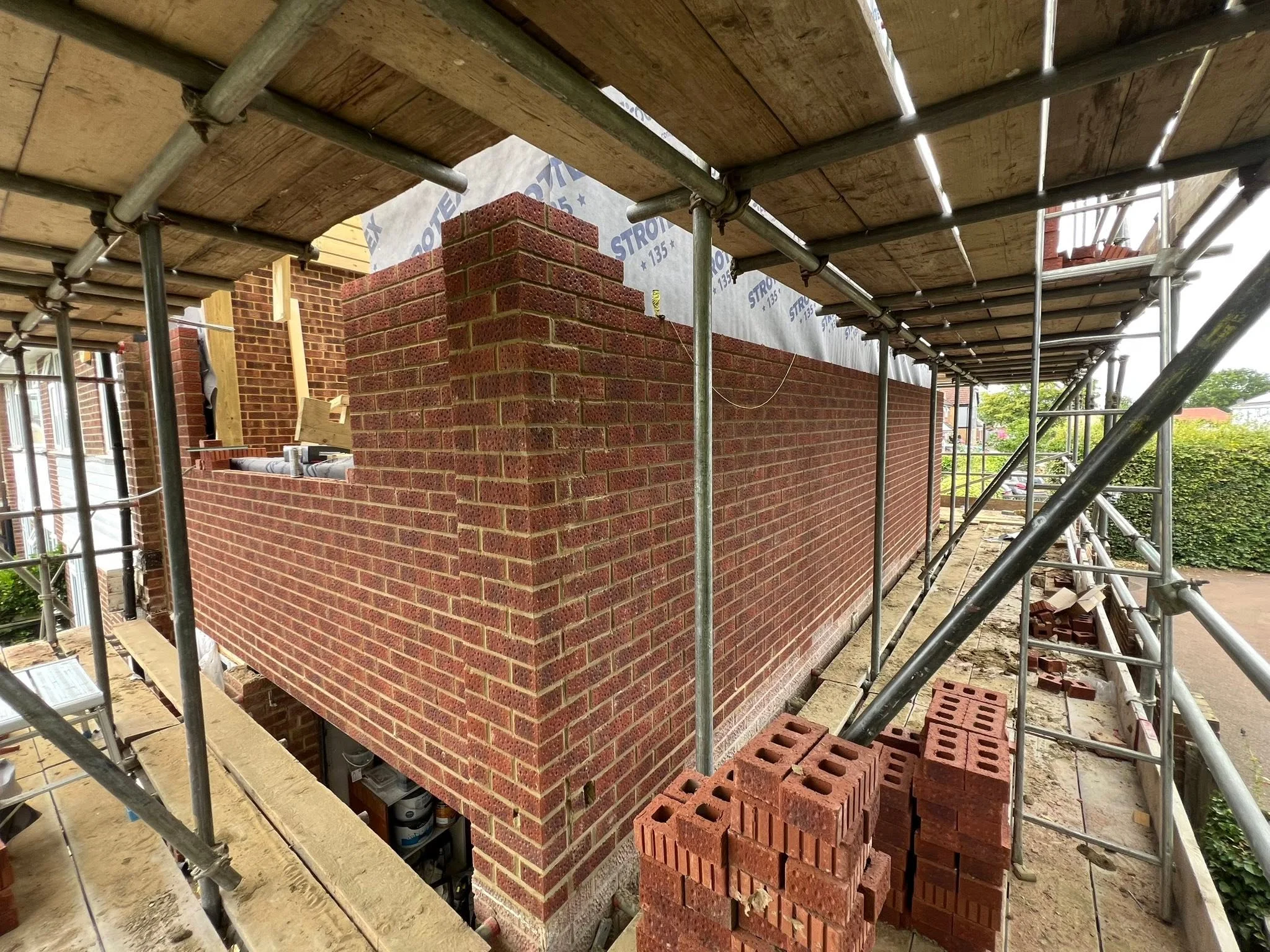 The Structural Retaining Wall and Terracing Masterclass: Engineering the Intersection of Structural Brickwork Kent and Advanced Landscaping Kent Groundworks